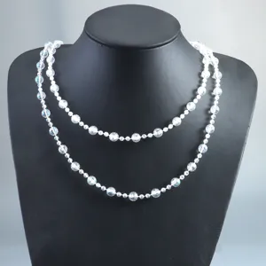 Detailed view of transparent crystal beaded garland for wedding party decor and event styling.