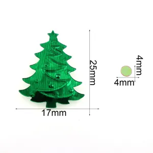 Green acrylic Christmas tree pendant and round sequin craft confetti for holiday decor.