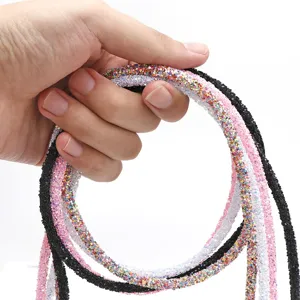 Colorful rhinestone tubes detail view, sparkling glitter DIY cord for shoes hair accessories.
