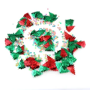 Christmas tree confetti sequins red green foil scatter for holiday party table decoration.