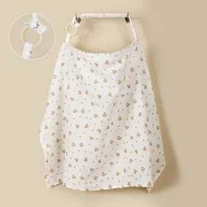 Floral print baby nursing cover detail showing wooden ring and breathable cotton gauze.