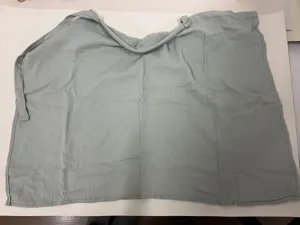 Breathable cotton nursing cover for breastfeeding mothers, adjustable neck strap in sage green.