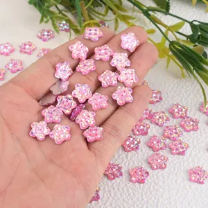 Strass en résine flocon d'étoile rose scintillant pour l'artisanat et la déco.