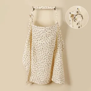 Floral cotton nursing cover detail featuring adjustable metal ring and breathable fabric.