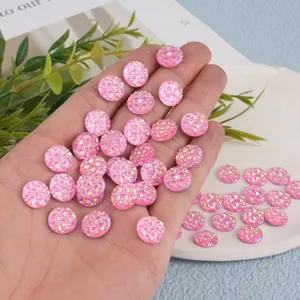 Pink AB flatback resin rhinestones for nail art, DIY crafts, and phone case decoration.