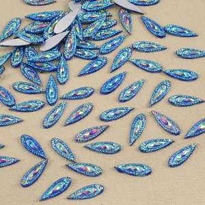 Blue iridescent horse eye flatback cabochon rhinestones for DIY jewelry crafting accessories.