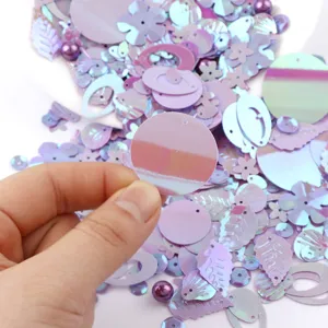 Colorful iridescent loose sequins for DIY crafts, garments, and handmade jewelry making.