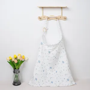 Detail shot of breathable cotton nursing cover with lovely blue celestial print for mothers.