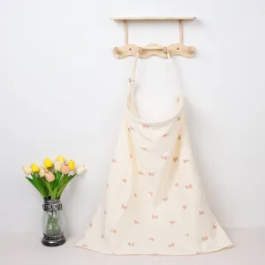 Cotton nursing cover with floral print, breathable breastfeeding scarf for mom and baby use.