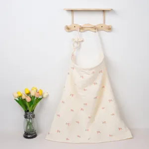 Cotton nursing cover detail, floral pattern, breathable double layer gauze for stroller use.