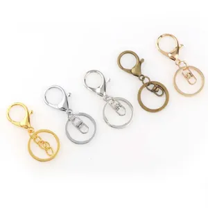 Set of metal lobster claw clasps with key rings for DIY jewelry craft accessories detail.