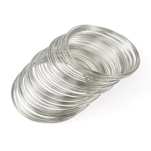 Close-up detail shot of silver memory wire loops for DIY jewelry making and bracelets.