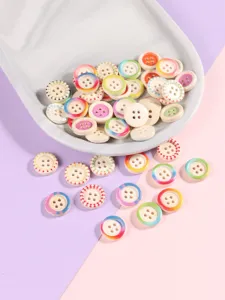 Close-up detail of 15mm four-hole colorful rim candy resin buttons for children sweaters and shirts.