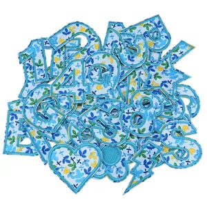 Floral letter and number embroidery patches set for clothing backpack DIY decoration detail.