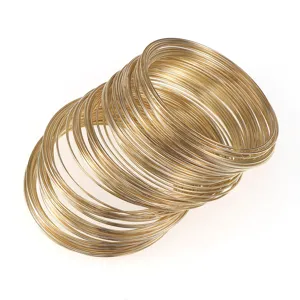 Close-up detail of golden memory wire loops, perfect for DIY jewelry crafting projects.