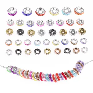 Close-up detail of colorful round wheel spacer beads and ABS plastic accessories for DIY jewelry.