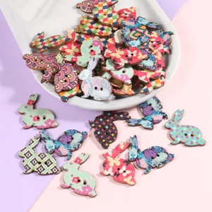 Detailed shot of colorful printed wooden rabbit buttons with two holes, perfect for sewing.