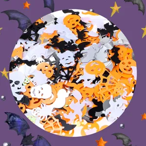 Halloween party confetti detail shot, mixed witch ghost bat and pumpkin sequins decor.
