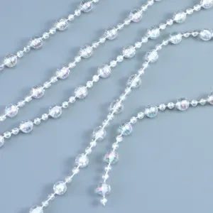 Transparent iridescent bead garland detail view for wedding decoration and DIY crafts.