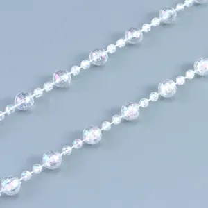 Clear iridescent faceted bead garland string for wedding party and event interior decoration.