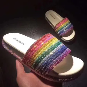 Stylish women's rainbow rhinestone slide sandals with thick sole for casual summer wear.