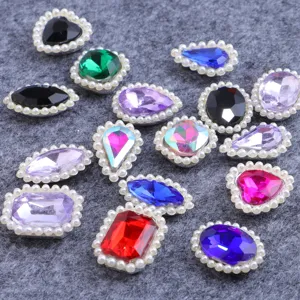 Colorful crystal rhinestones with pearl border, assorted shapes for DIY craft decor.