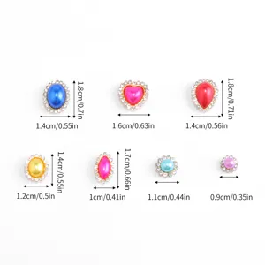 ABS rhinestone button DIY craft embellishment set with various shapes and sizes for garments.
