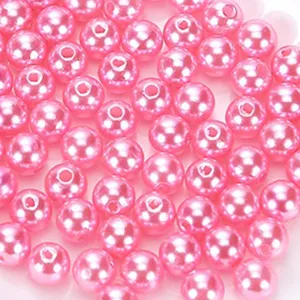 Perle di imitazione ABS rosa con fori per la creazione di gioielli fai da te dettaglio.