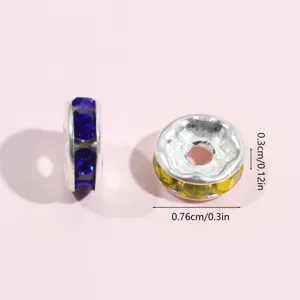 Colorful rhinestone spacer beads DIY jewelry accessories close-up view detail display.