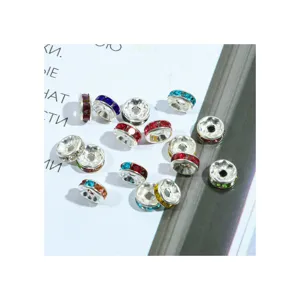 Colorful rhinestone metal spacer beads for DIY bracelets and jewelry making crafts.