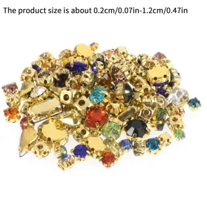 Mixed glass sew-on rhinestones with gold claw settings, colorful DIY garment accessories.