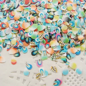 Close-up detail of colorful polymer clay slices in leaf and droplet shapes for nail art and DIY craft.