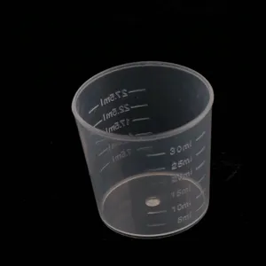 Disposable plastic measuring cup with clear graduation marks, ideal for DIY epoxy resin crafts.