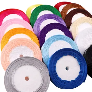 Detailed view of 20mm colorful satin ribbon rolls, perfect for gift wrapping and DIY crafts.