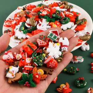 Christmas miniature resin charms detail close up view of cute holiday craft accessories.