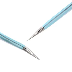Close-up detail of precision stainless steel tweezer tips in light blue color finish.