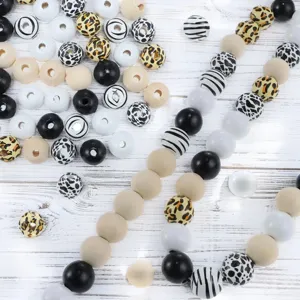 DIY wooden craft beads mix, animal print leopard zebra cow patterns and solid color beads for jewelry.