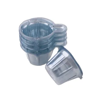 Disposable plastic measuring cups for DIY epoxy resin craft mixing, clear craft tools stack.