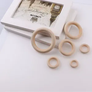 Anneaux en bois pour travaux manuels, poignees de sac et accessoires de rideau varies.