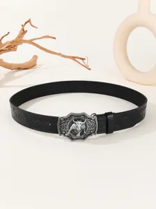 Vintage embossed leather men's belt with intricate western bull buckle detailed view.