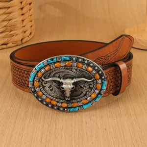 Close-up detail of western retro belt featuring bull skull buckle and embossed PU leather strap.