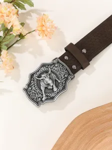 Close-up detail of vintage men leather belt featuring an intricate silver bull head buckle.