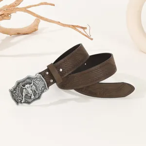 Vintage men's leather belt with ornate bull head metal buckle and embossed strap design.