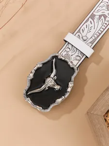 Western cowboy leather belt featuring carved floral strap and striking longhorn bull buckle.