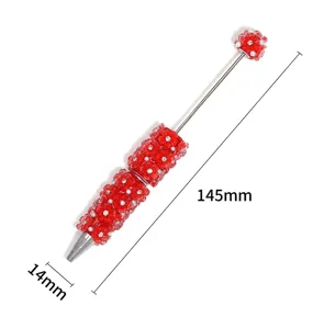 Red floral beaded pen detail showing length 145mm and width 14mm with rhinestones.