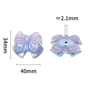 Vue détaillée de perle nœud papillon 3D dégradé pailleté pour chaînes de téléphone et bijoux.