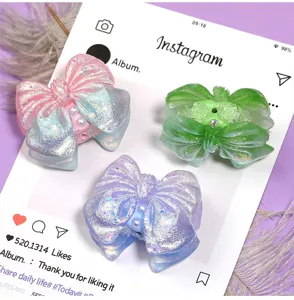 Magnifiques charms nœuds papillon pailletés dégradés avec perles pour bijoux de téléphone.