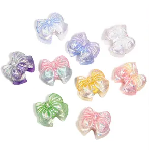 Détails de nœud papillon pailleté coloré pendentifs en résine dégradé pour bricolage.