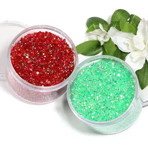 Detail view of colorful resin flatback rhinestones in clear jars, perfect for nail art and DIY crafts.