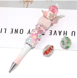 Stylo a bille en perles DIY avec strass en cristal, perles et charmants pendentifs peluche.